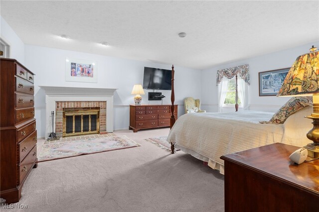 8640 Foxglove Ave NW, Clinton, OH 44216 - bedroom with carpet flooring and a fireplace