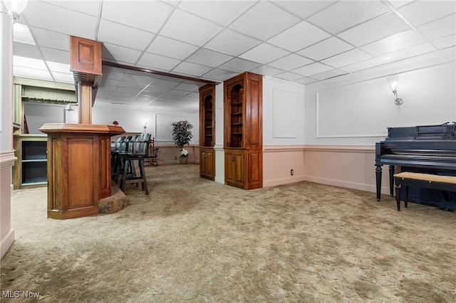 8640 Foxglove Ave NW, Clinton, OH 44216 - indoor dry bar with carpet flooring and a paneled ceiling