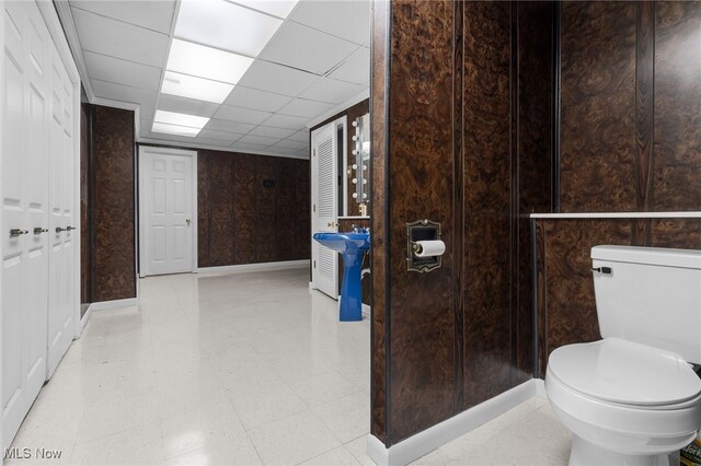 8640 Foxglove Ave NW, Clinton, OH 44216 - bathroom with baseboards and tile patterned floors