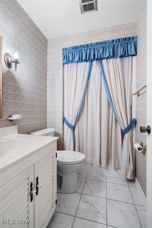 8640 Foxglove Ave NW, Clinton, OH 44216 - bathroom with vanity and marble finish floors