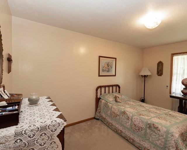 4053 Quail Ct, Ashtabula, OH 44004 - bedroom featuring carpet floors and baseboards