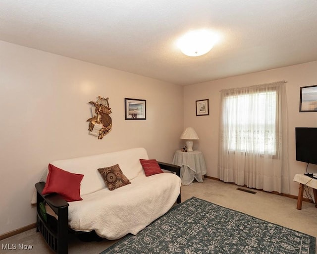 4053 Quail Ct, Ashtabula, OH 44004 - carpeted living room featuring baseboards