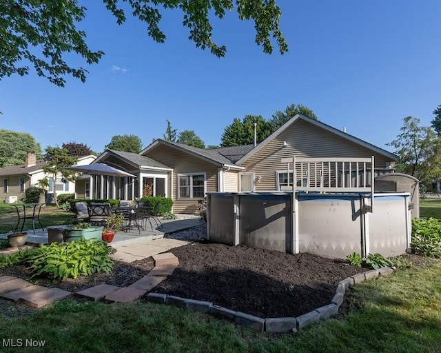 4053 Quail Ct, Ashtabula, OH 44004 - back of property with an outdoor pool and a gazebo