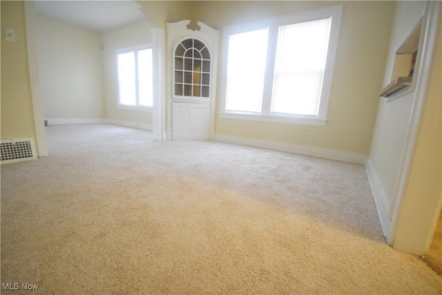 853 E 144th St, Cleveland, OH 44110 - carpeted spare room featuring baseboards