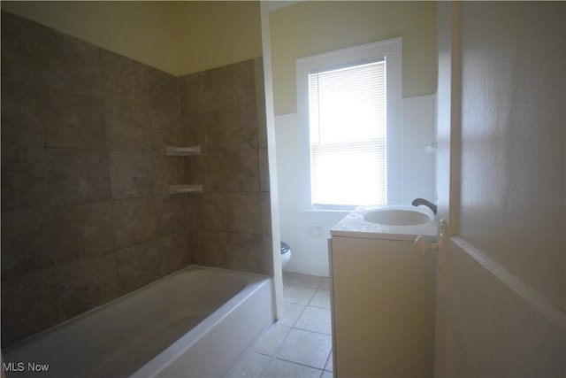 853 E 144th St, Cleveland, OH 44110 - bathroom with vanity, tile patterned flooring, and shower / bathtub combination