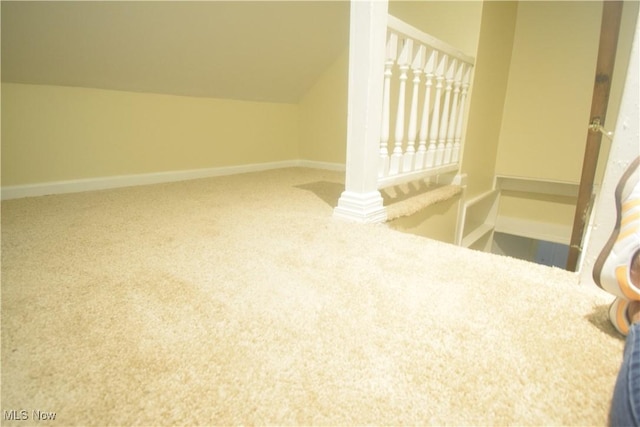 853 E 144th St, Cleveland, OH 44110 - stairs featuring carpet floors and vaulted ceiling