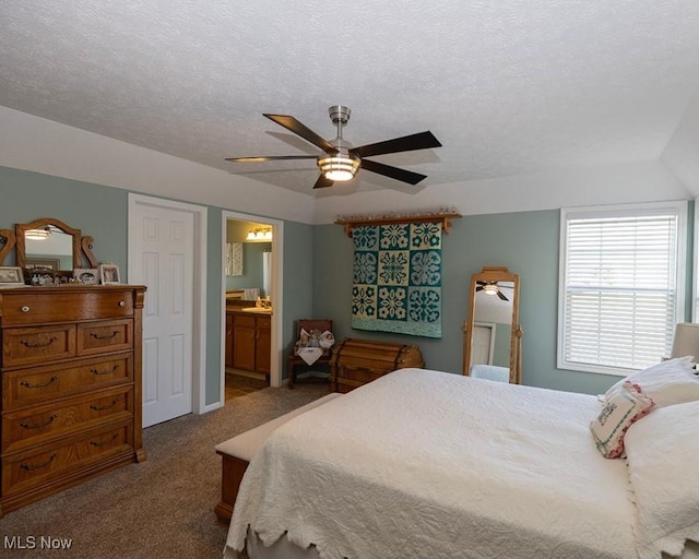 114 Westminster Way, Elyria, OH 44035 - carpeted bedroom with ensuite bath, ceiling fan, and a textured ceiling