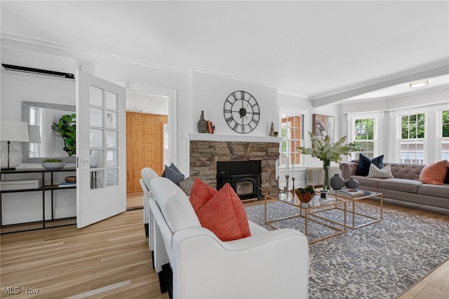 3294 Avalon Rd, Shaker Heights, OH 44120 - living area featuring wood finished floors, radiator, an AC wall unit, and ornamental molding