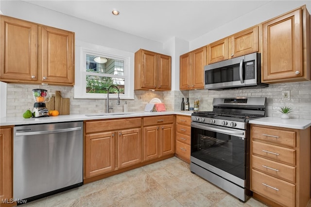 3294 Avalon Rd, Shaker Heights, OH 44120 - kitchen featuring stainless steel appliances, light countertops, tasteful backsplash, and brown cabinetry