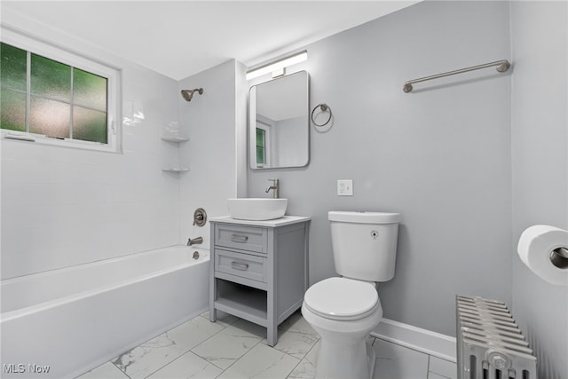 3294 Avalon Rd, Shaker Heights, OH 44120 - bathroom with radiator, marble look tiles, vanity, and bathing tub / shower combination