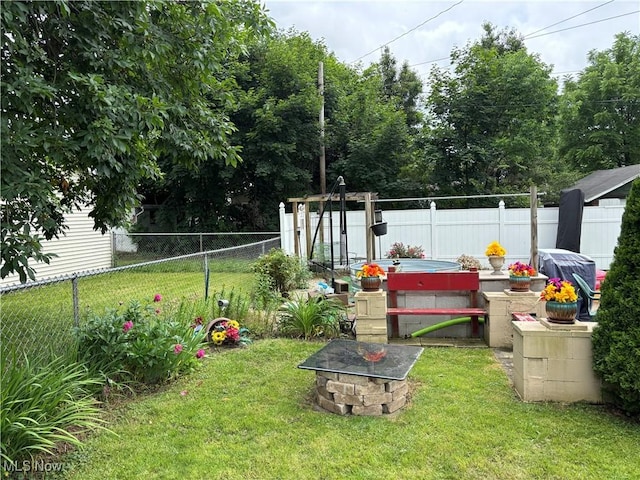 629 E 5th St, Salem, OH 44460 - view of yard featuring an outdoor fire pit