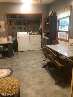 629 E 5th St, Salem, OH 44460 - dining space featuring washer and dryer and light floors