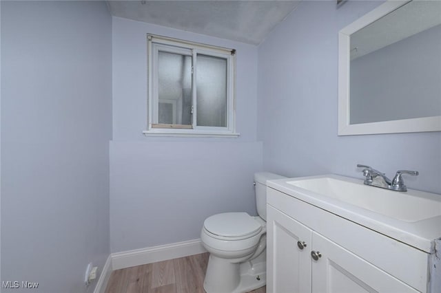 6633 Tamarind Dr, Bedford Heights, OH 44146 - bathroom featuring vanity and wood finished floors