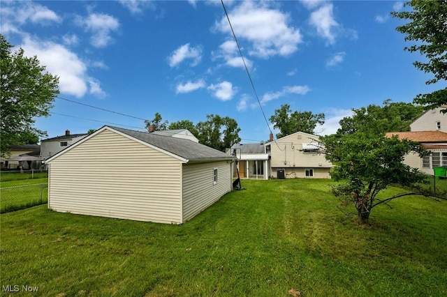 6633 Tamarind Dr, Bedford Heights, OH 44146 - rear view of property with a shingled roof