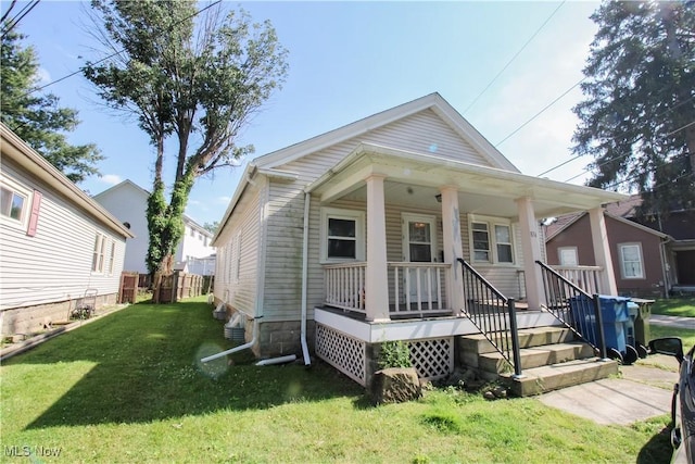 874 Cleveland Ave, Amherst, OH 44001 - view of front of property featuring covered porch