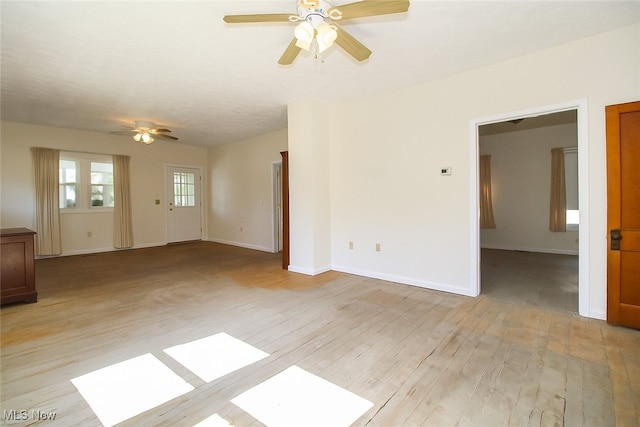 874 Cleveland Ave, Amherst, OH 44001 - spare room featuring ceiling fan and light wood-style floors