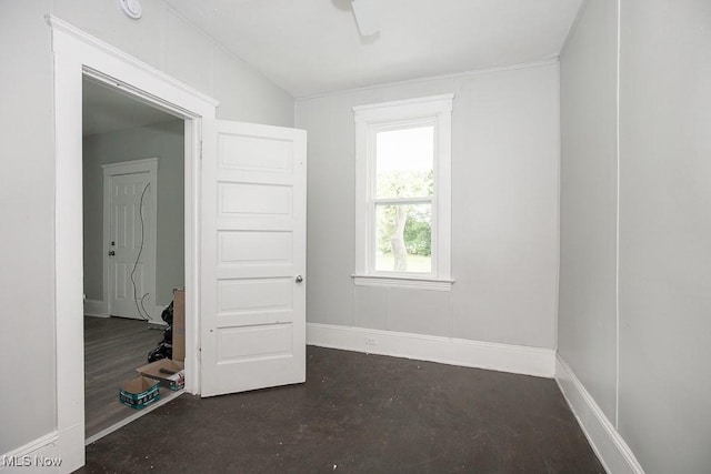 8023 Kosciuszko Ave, Cleveland, OH 44103 - unfurnished room featuring concrete floors and a ceiling fan