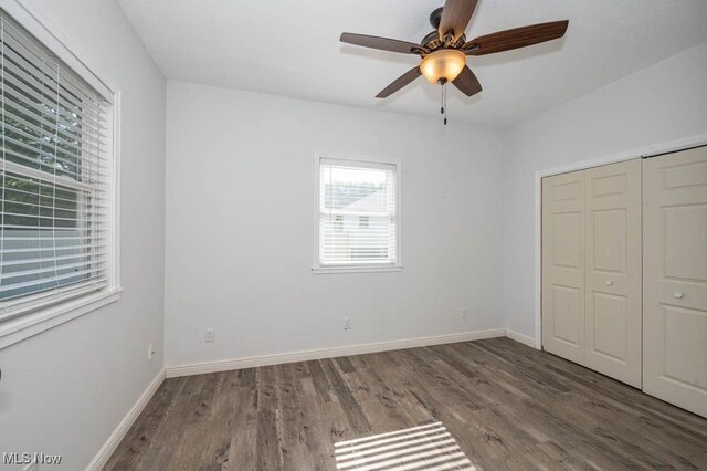 2692 Aspen Dr, Girard, OH 44420 - unfurnished bedroom featuring wood finished floors, a closet, and ceiling fan
