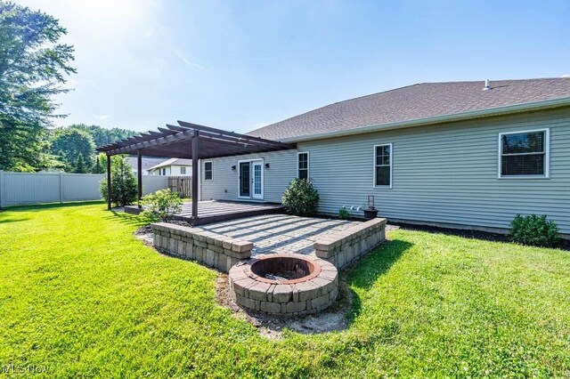 2692 Aspen Dr, Girard, OH 44420 - rear view of property featuring a pergola, an outdoor fire pit, and a patio area