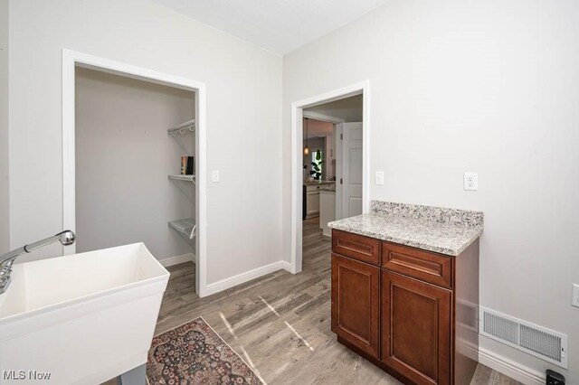 2692 Aspen Dr, Girard, OH 44420 - bathroom with wood finished floors and a sink
