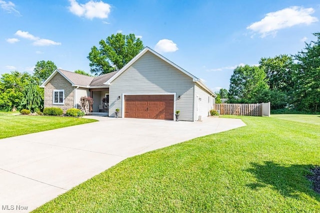 2692 Aspen Dr, Girard, OH 44420 - view of front of property with a garage and concrete driveway