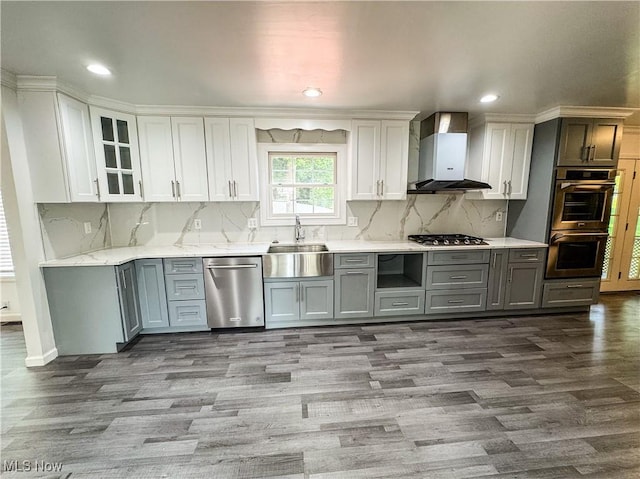 5123 Glenbrook Dr, Vienna, WV 26105 - kitchen with appliances with stainless steel finishes, wall chimney exhaust hood, wood finished floors, recessed lighting, and gray cabinets
