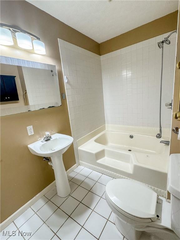 5123 Glenbrook Dr, Vienna, WV 26105 - full bathroom with tile patterned floors and tub / shower combination