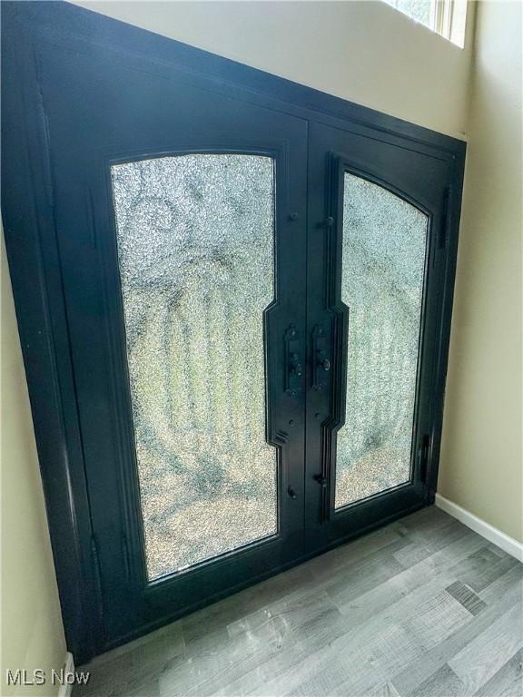 5123 Glenbrook Dr, Vienna, WV 26105 - detailed view of french doors and wood finished floors