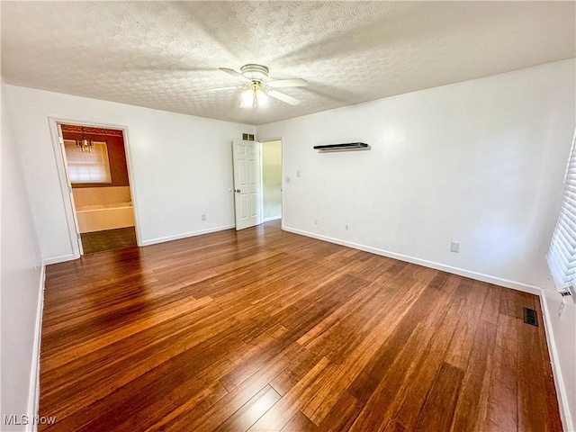 5123 Glenbrook Dr, Vienna, WV 26105 - unfurnished room with hardwood / wood-style floors, a ceiling fan, and a textured ceiling