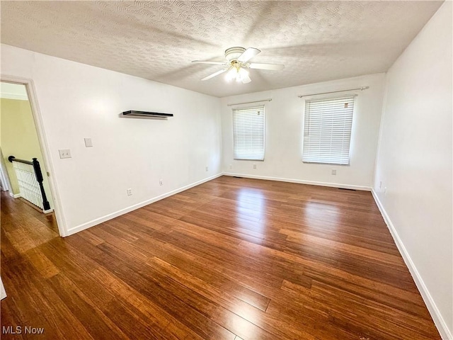 5123 Glenbrook Dr, Vienna, WV 26105 - spare room with ceiling fan, wood finished floors, and a textured ceiling