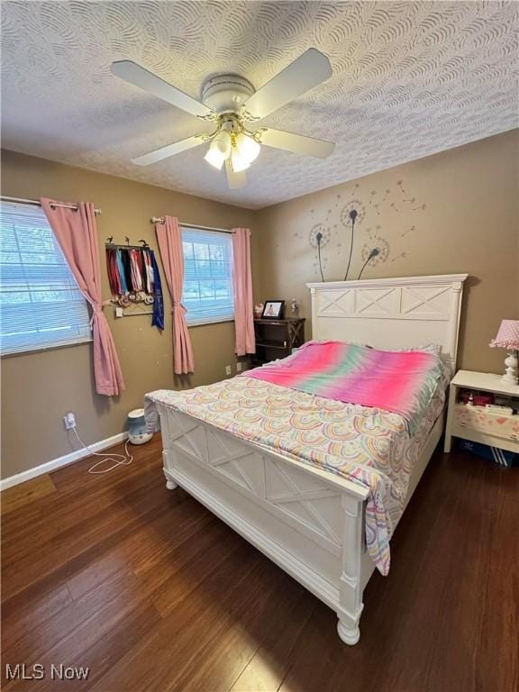 5123 Glenbrook Dr, Vienna, WV 26105 - bedroom featuring wood finished floors, a textured ceiling, and ceiling fan