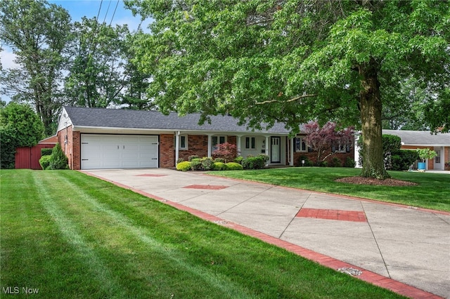 3612 Vezber Dr, Seven Hills, OH 44131 - single story home with brick siding, a garage, a front yard, and concrete driveway