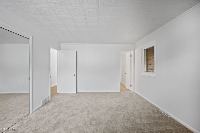 3612 Vezber Dr, Seven Hills, OH 44131 - spare room featuring carpet and ornamental molding