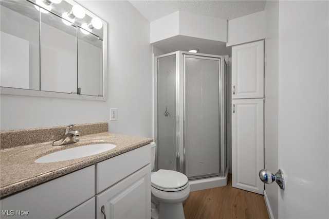 3612 Vezber Dr, Seven Hills, OH 44131 - full bath with a stall shower, vanity, and wood finished floors