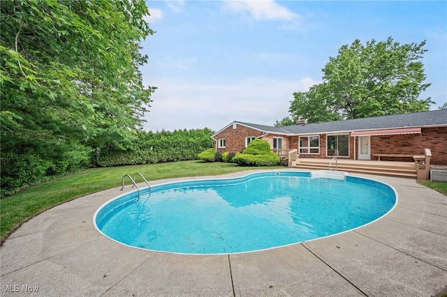 3612 Vezber Dr, Seven Hills, OH 44131 - swimming pool featuring a wooden deck and a lawn