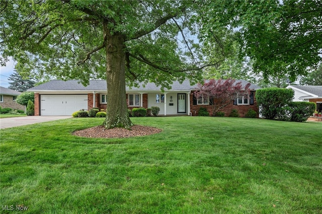 3612 Vezber Dr, Seven Hills, OH 44131 - single story home with an attached garage, driveway, brick siding, and a front lawn