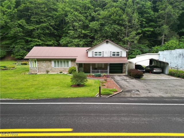 13088 Clay Hwy, Lizemores, WV 25125 - view of front of home with a detached carport, driveway, a front lawn, stone siding, and a porch