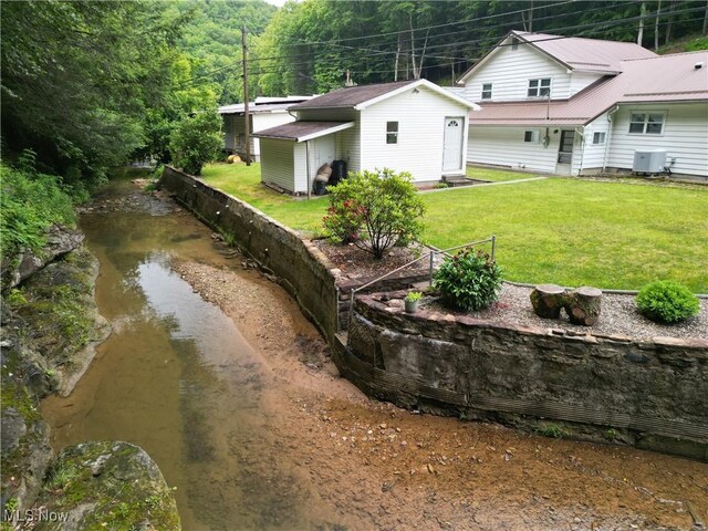 13088 Clay Hwy, Lizemores, WV 25125 - view of green lawn featuring an outbuilding