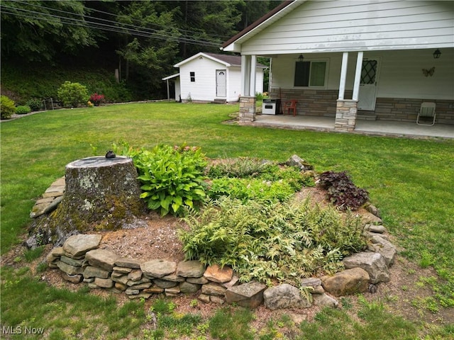 13088 Clay Hwy, Lizemores, WV 25125 - view of grassy yard featuring a patio