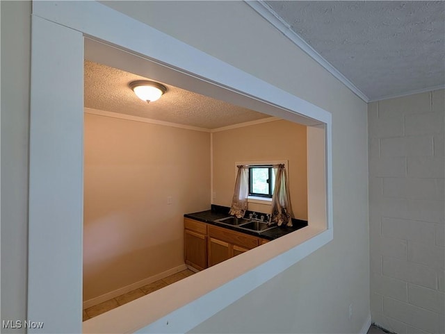 963 Ivydale Rd, Clay, WV 25043 - corridor with a textured ceiling and ornamental molding