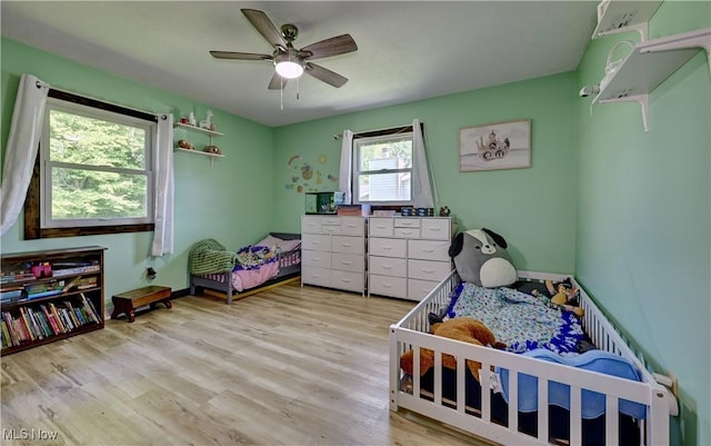 816 Vincent Dr, Loudonville, OH 44842 - bedroom featuring light wood-style flooring and ceiling fan