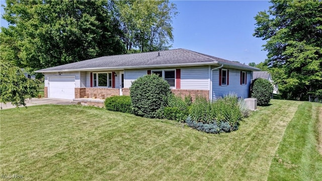 816 Vincent Dr, Loudonville, OH 44842 - ranch-style house with brick siding, an attached garage, driveway, and a front yard