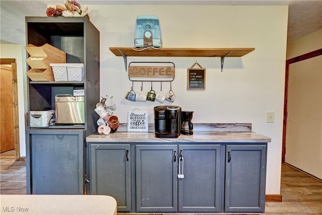 816 Vincent Dr, Loudonville, OH 44842 - bar with light wood-style flooring