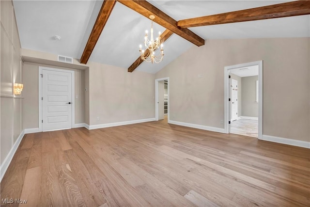 2705 Rocky Ridge Dr, Westlake, OH 44145 - unfurnished living room with a chandelier and light wood-type flooring
