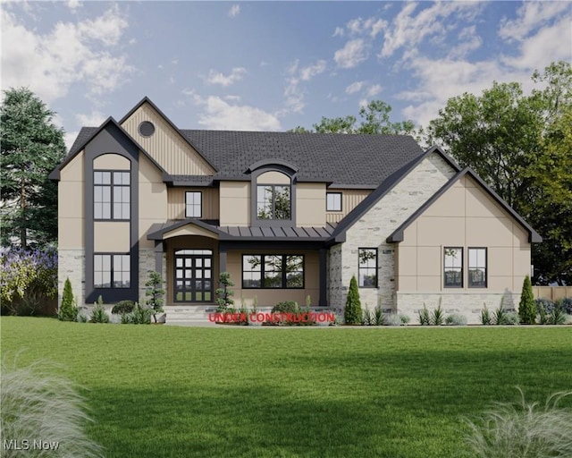2705 Rocky Ridge Dr, Westlake, OH 44145 - view of front of property featuring stone siding, a standing seam roof, a front yard, a metal roof, and french doors
