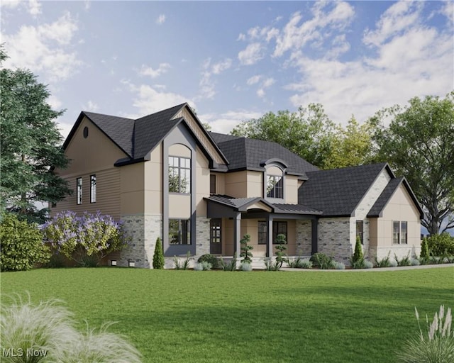 2705 Rocky Ridge Dr, Westlake, OH 44145 - french provincial home with a front lawn, stone siding, covered porch, a standing seam roof, and a metal roof