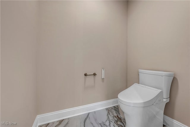 2705 Rocky Ridge Dr, Westlake, OH 44145 - bathroom with baseboards and marble look tiles