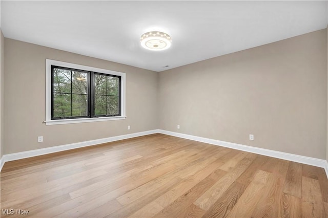 2705 Rocky Ridge Dr, Westlake, OH 44145 - unfurnished room with light wood-type flooring and baseboards