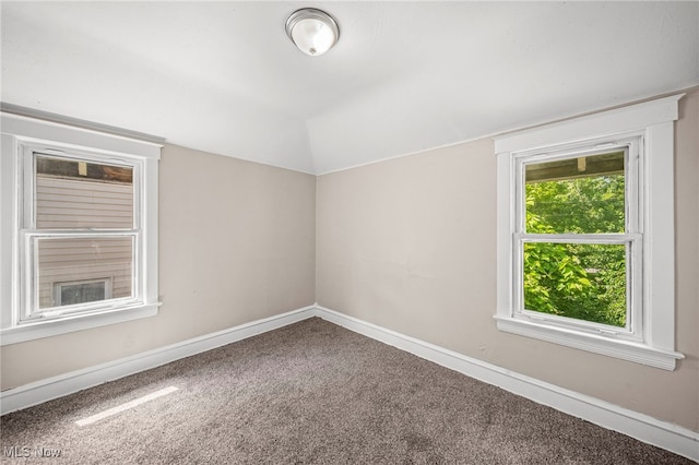 12525 Lancelot Ave, Cleveland, OH 44108 - spare room featuring lofted ceiling and carpet