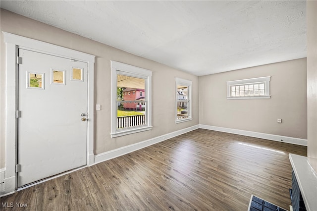 12525 Lancelot Ave, Cleveland, OH 44108 - foyer entrance featuring wood finished floors and baseboards
